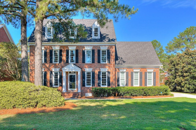 3463 Rhodes Hill Dr, Augusta, GA 30907 - colonial house with brick siding, a front yard, and a shingled roof