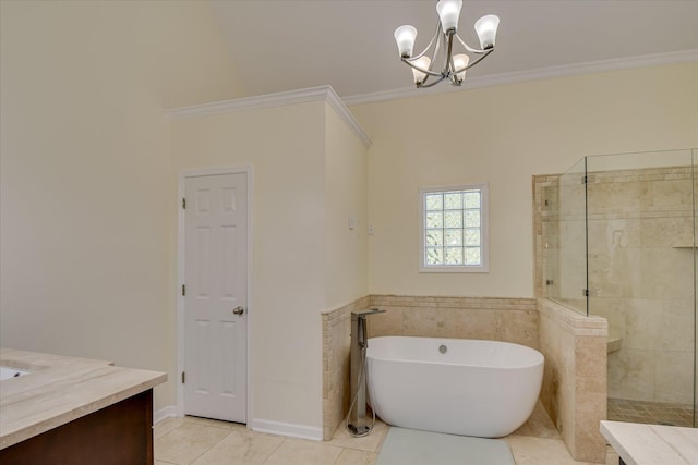3463 Rhodes Hill Dr, Augusta, GA 30907 - bathroom with a freestanding bath, tile patterned flooring, vanity, a chandelier, and ornamental molding