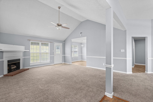 4308 Felmellow Dr, Grovetown, GA 30813 - unfurnished living room with carpet, ceiling fan, vaulted ceiling, baseboards, and plenty of natural light