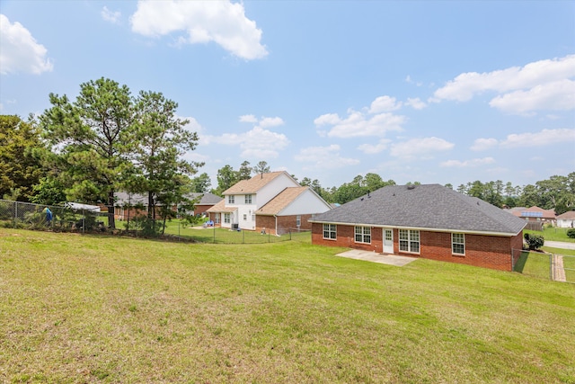 4308 Felmellow Dr, Grovetown, GA 30813 - rear view of house with a patio area, brick siding, and roof with shingles
