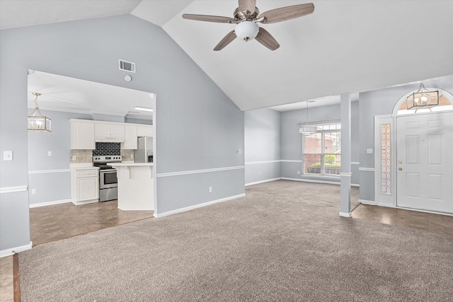 4308 Felmellow Dr, Grovetown, GA 30813 - unfurnished living room featuring light carpet, high vaulted ceiling, baseboards, a ceiling fan, and a chandelier
