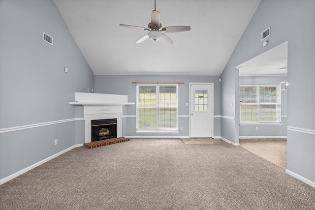 4308 Felmellow Dr, Grovetown, GA 30813 - unfurnished living room featuring carpet floors, a ceiling fan, a fireplace, baseboards, and high vaulted ceiling