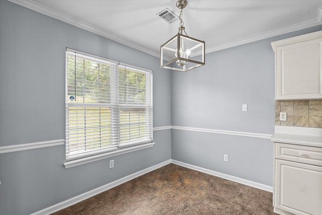 4308 Felmellow Dr, Grovetown, GA 30813 - unfurnished dining area featuring a chandelier, ornamental molding, and baseboards