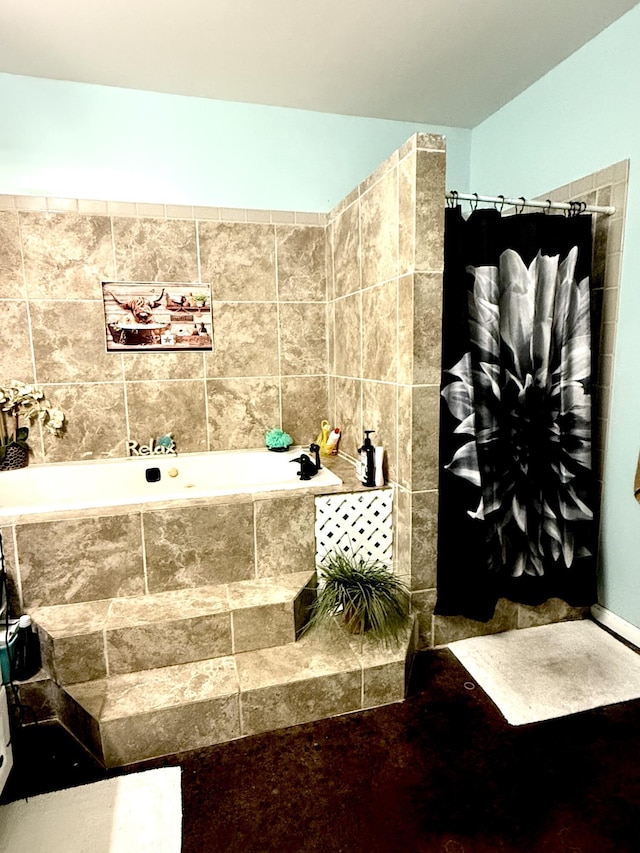 bathroom with tiled bath