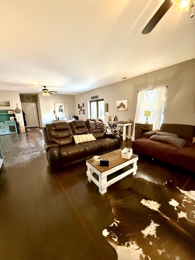 living room featuring ceiling fan