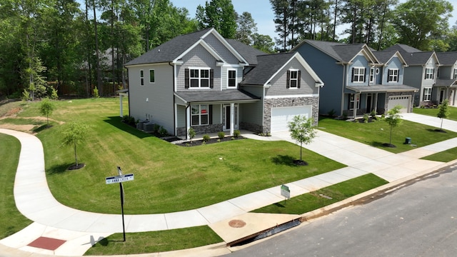 craftsman-style house featuring a porch, a front yard, central AC unit, and a garage