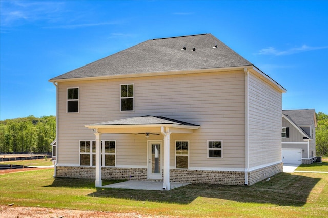 1428 Elias Sta, Thomson, GA 30824 - back of property with a yard, a patio, and ceiling fan