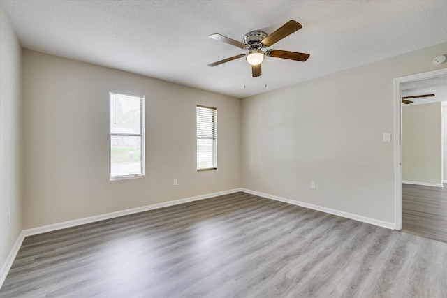 2913 Kings View Dr, Augusta, GA 30909 - unfurnished room with wood finished floors, a ceiling fan, a textured ceiling, and a smoke detector