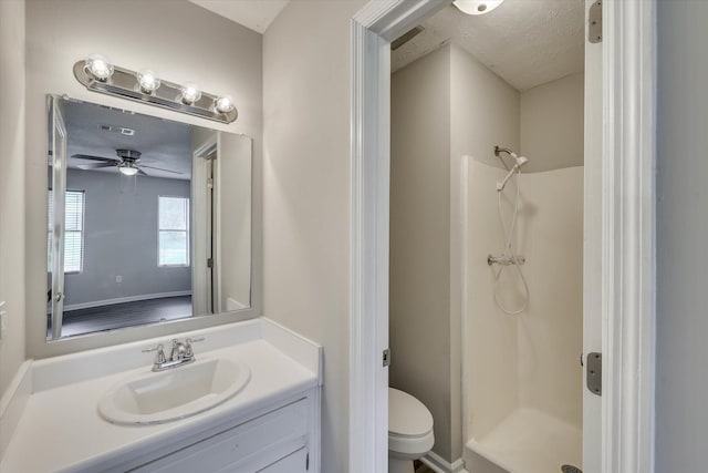 2913 Kings View Dr, Augusta, GA 30909 - bathroom featuring vanity, a shower, ceiling fan, and a textured ceiling