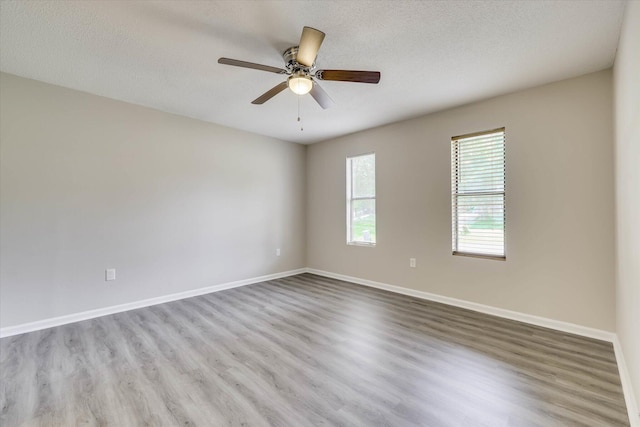 2913 Kings View Dr, Augusta, GA 30909 - empty room featuring wood finished floors, a ceiling fan, and a textured ceiling