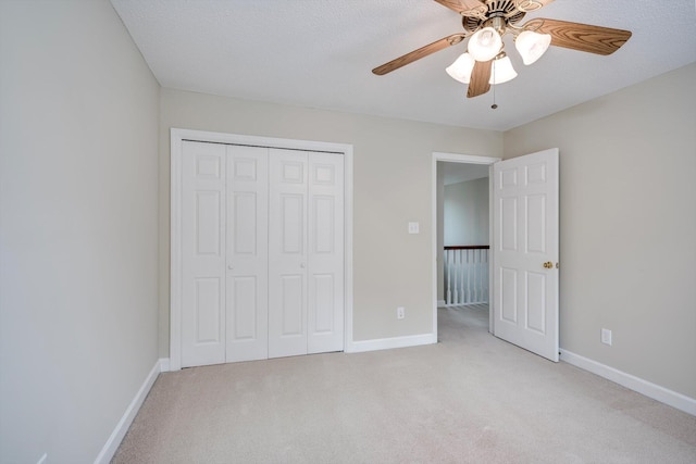 5107 Windmill Pl, Evans, GA 30809 - unfurnished bedroom featuring light colored carpet, a closet, and ceiling fan