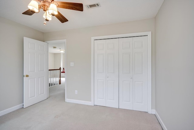 5107 Windmill Pl, Evans, GA 30809 - unfurnished bedroom with carpet, a closet, and ceiling fan