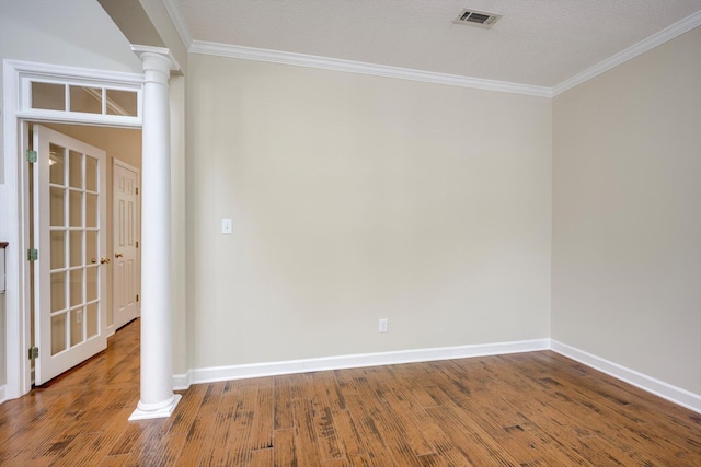 5107 Windmill Pl, Evans, GA 30809 - unfurnished room featuring ornate columns, crown molding, and wood finished floors