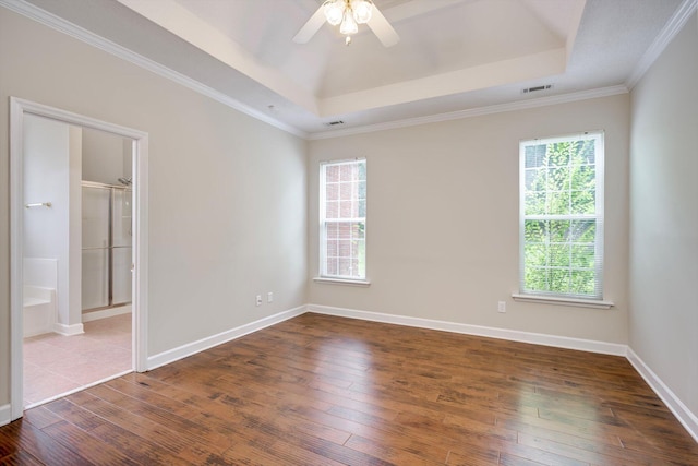 5107 Windmill Pl, Evans, GA 30809 - unfurnished room featuring a raised ceiling, plenty of natural light, a ceiling fan, hardwood / wood-style floors, and ornamental molding
