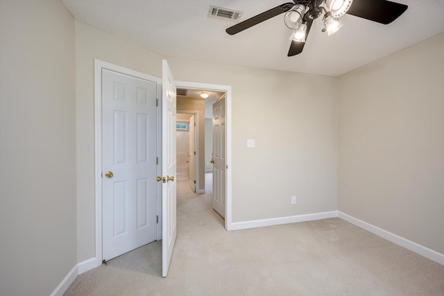 5107 Windmill Pl, Evans, GA 30809 - unfurnished bedroom with light colored carpet and a ceiling fan