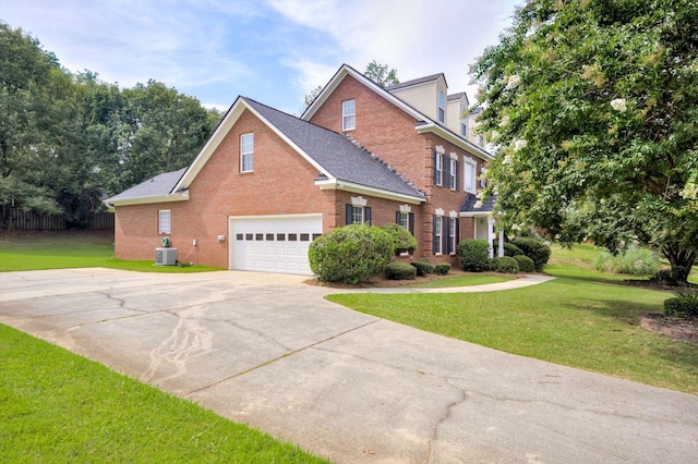 5107 Windmill Pl, Evans, GA 30809 - view of side of property featuring brick siding, concrete driveway, and an attached garage