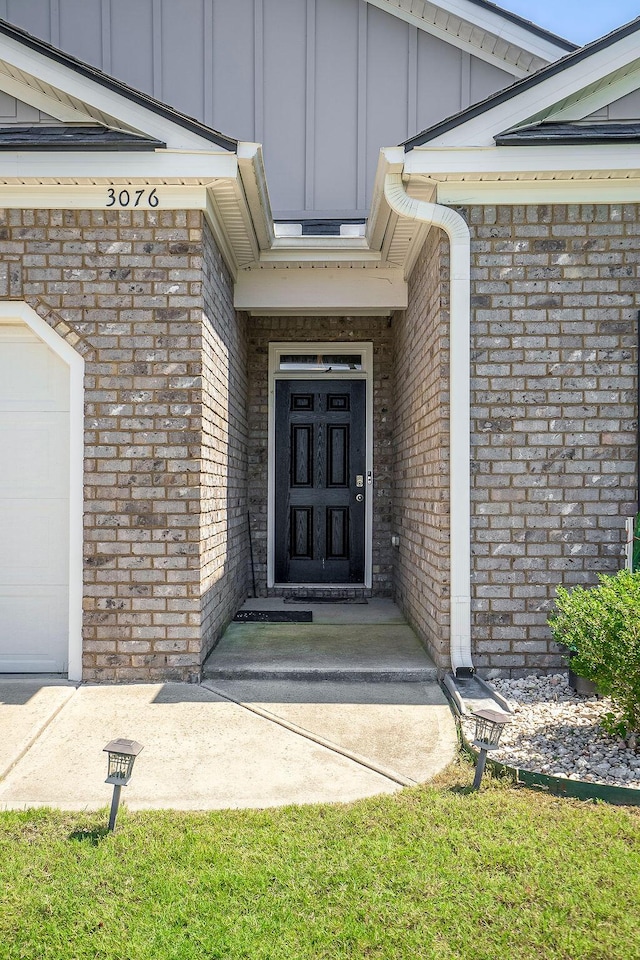 3076 White Gate Loop, Aiken, SC 29801 - property entrance featuring board and batten siding and brick siding