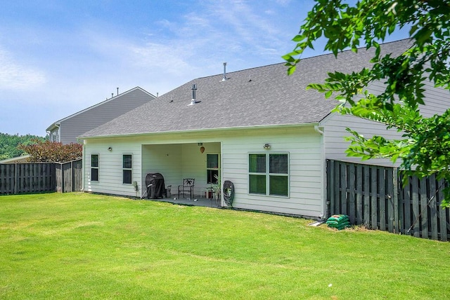 3076 White Gate Loop, Aiken, SC 29801 - back of property with a fenced backyard, a patio, and a shingled roof