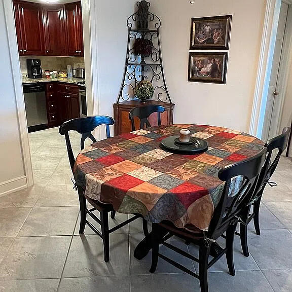 dining room with light tile patterned floors