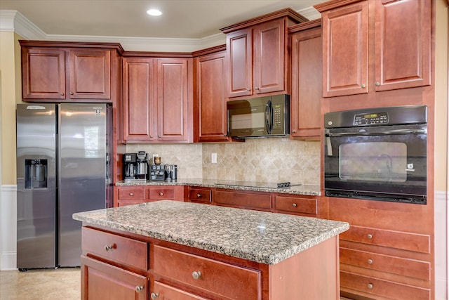 3051 Parkridge Dr, Grovetown, GA 30813 - kitchen with black appliances, light stone counters, backsplash, a center island, and ornamental molding