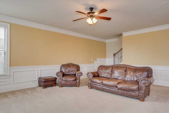 3051 Parkridge Dr, Grovetown, GA 30813 - living room with carpet, crown molding, wainscoting, a ceiling fan, and a decorative wall