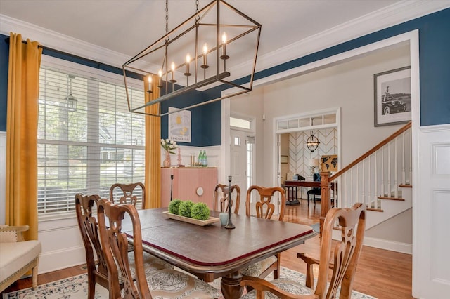 4002 Backwater Ct, Evans, GA 30809 - dining area featuring ornamental molding, wood finished floors, and stairs