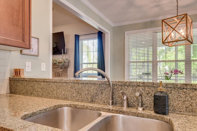 4002 Backwater Ct, Evans, GA 30809 - kitchen with pendant lighting, crown molding, decorative backsplash, and a sink