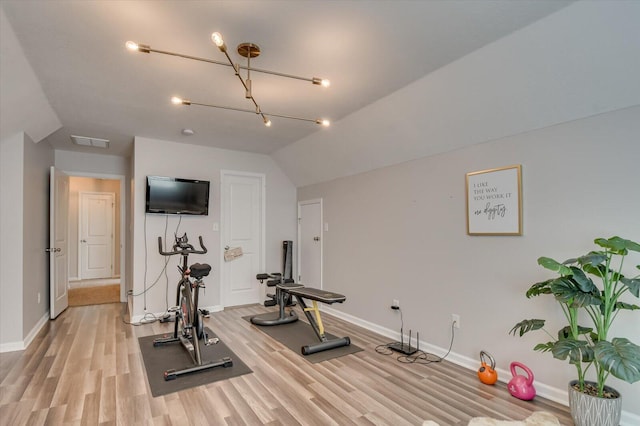 4002 Backwater Ct, Evans, GA 30809 - workout area with visible vents, baseboards, vaulted ceiling, and light wood-style floors