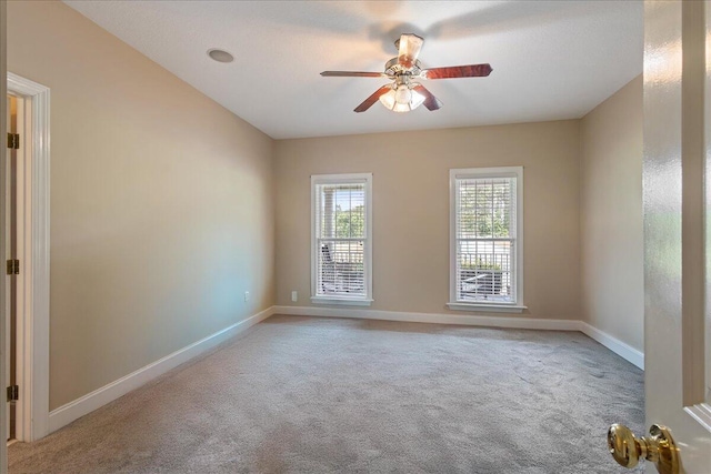 698 Heggies Ridge Dr, Appling, GA 30802 - carpeted spare room with baseboards and ceiling fan