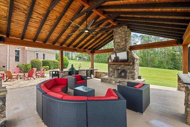 698 Heggies Ridge Dr, Appling, GA 30802 - view of patio with ceiling fan, an outdoor living space with a fireplace, a gazebo, and a sink