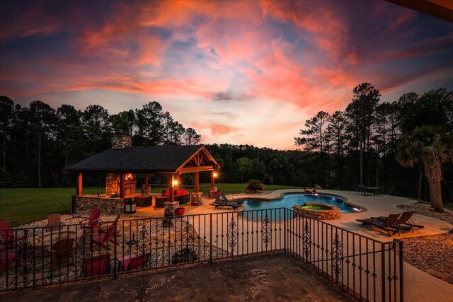 698 Heggies Ridge Dr, Appling, GA 30802 - view of swimming pool featuring a gazebo, a patio, an in-ground hot tub, a forest view, and a yard