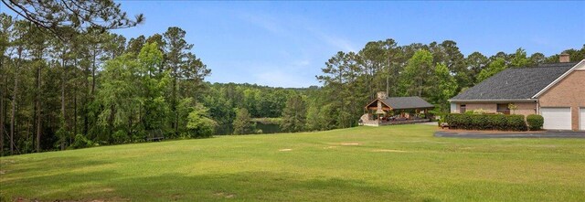 698 Heggies Ridge Dr, Appling, GA 30802 - view of green lawn with a gazebo and a view of trees