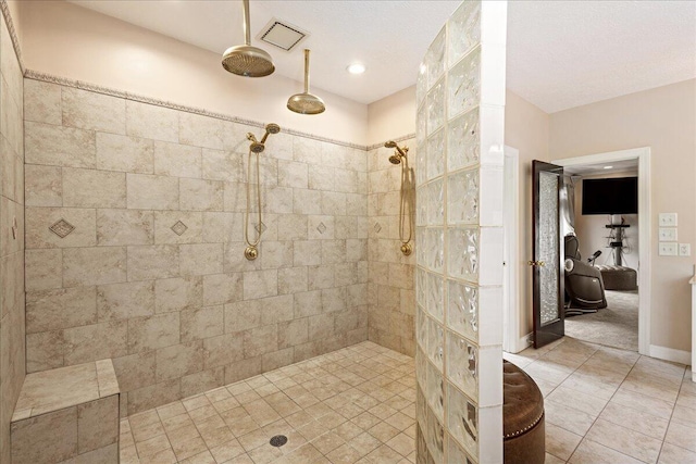 698 Heggies Ridge Dr, Appling, GA 30802 - ensuite bathroom with a tile shower and tile patterned floors