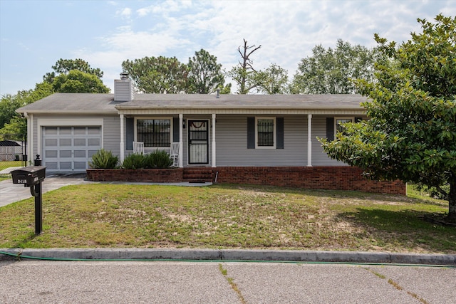 3415 Pine Hill Rd, Hephzibah, GA 30815 - ranch-style home featuring an attached garage, a porch, a front lawn, a chimney, and driveway