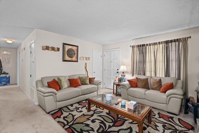 3415 Pine Hill Rd, Hephzibah, GA 30815 - carpeted living room featuring a textured ceiling
