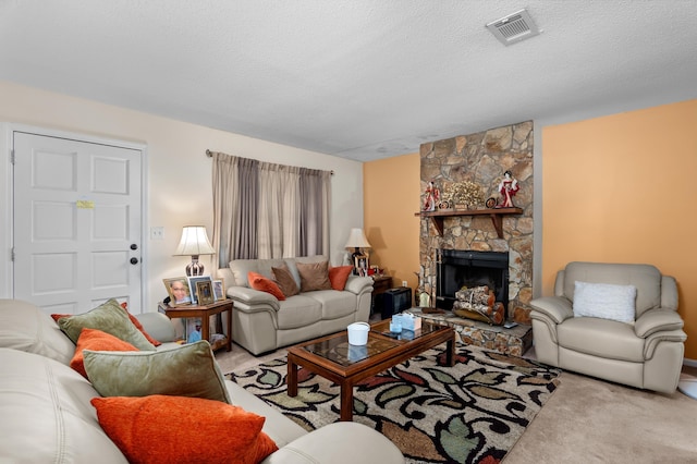 3415 Pine Hill Rd, Hephzibah, GA 30815 - living room with carpet flooring, a stone fireplace, and a textured ceiling