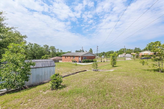 3415 Pine Hill Rd, Hephzibah, GA 30815 - view of yard with a storage shed