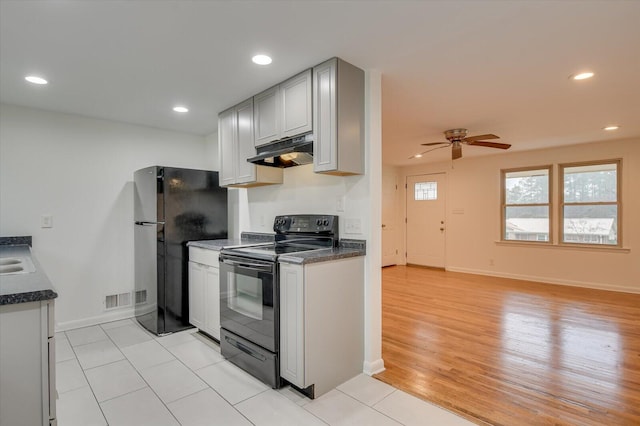 kitchen with gray cabinetry, light hardwood / wood-style flooring, black appliances, and ceiling fan