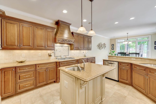 kitchen featuring decorative light fixtures, sink, stainless steel appliances, light stone countertops, and custom range hood