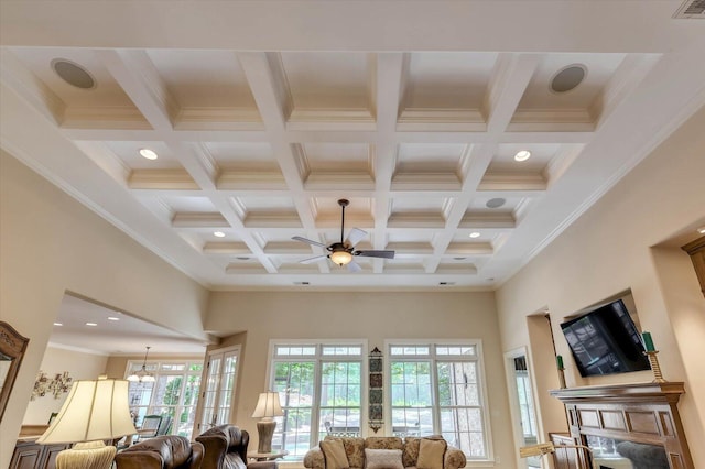 living room with coffered ceiling, beam ceiling, and a high ceiling