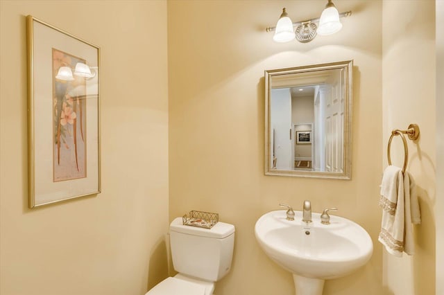 bathroom with sink and toilet