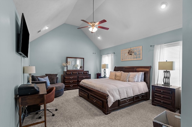 bedroom with vaulted ceiling, light colored carpet, multiple windows, recessed lighting, and a ceiling fan
