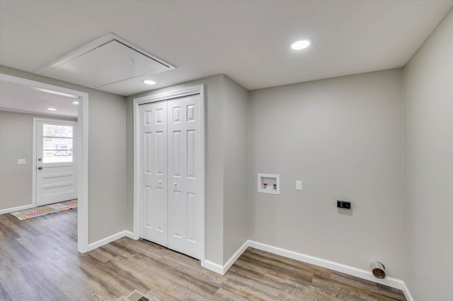 laundry room featuring hookup for an electric dryer, washer hookup, and hardwood / wood-style flooring