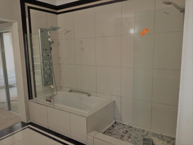 bathroom with tile patterned flooring