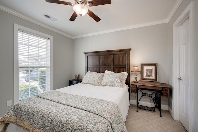 bedroom featuring light carpet, baseboards, visible vents, and crown molding