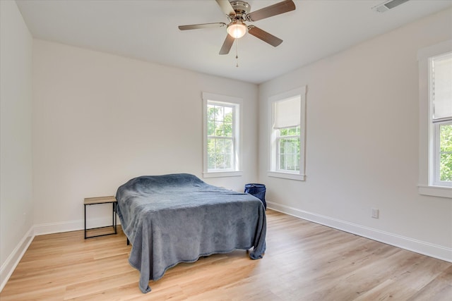 1107 Adrian St, Augusta, GA 30904 - bedroom with light wood-style flooring, baseboards, and ceiling fan
