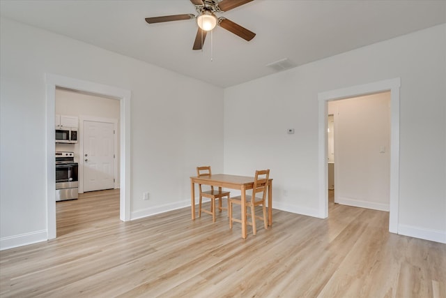 1107 Adrian St, Augusta, GA 30904 - dining space with light wood-style floors, ceiling fan, and baseboards