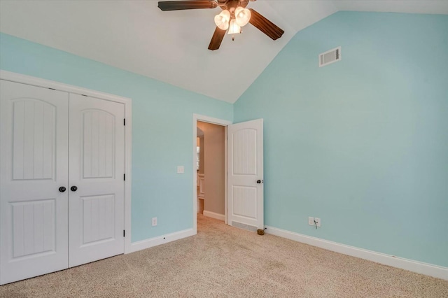 702 Southwick Ave, Grovetown, GA 30813 - unfurnished bedroom with a closet, baseboards, carpet flooring, visible vents, and lofted ceiling