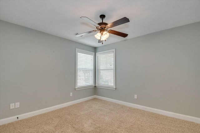 702 Southwick Ave, Grovetown, GA 30813 - spare room featuring baseboards, a ceiling fan, and light carpet