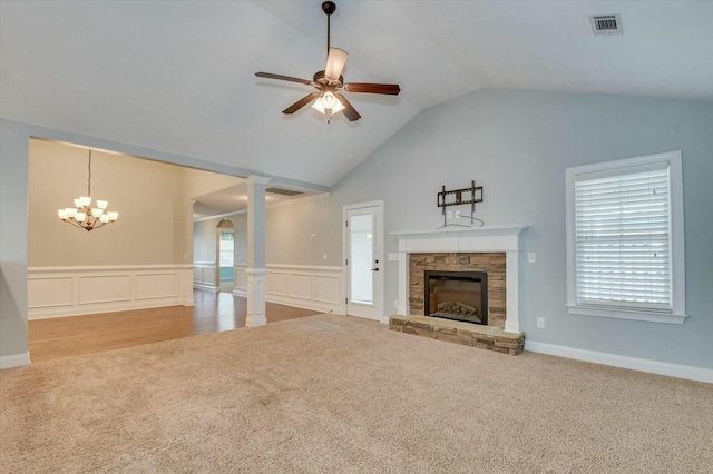 702 Southwick Ave, Grovetown, GA 30813 - unfurnished living room featuring visible vents, a fireplace, vaulted ceiling, and carpet